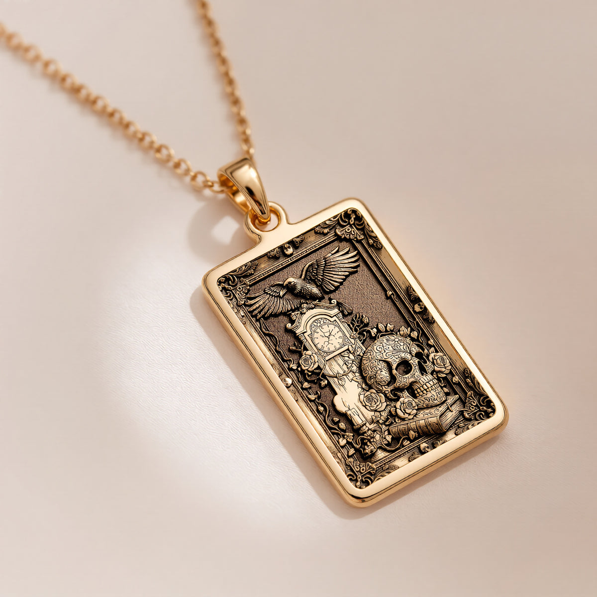 14K solid gold Skull Tarot Pendant necklace in gothic Memento Mori style with winged skull design.