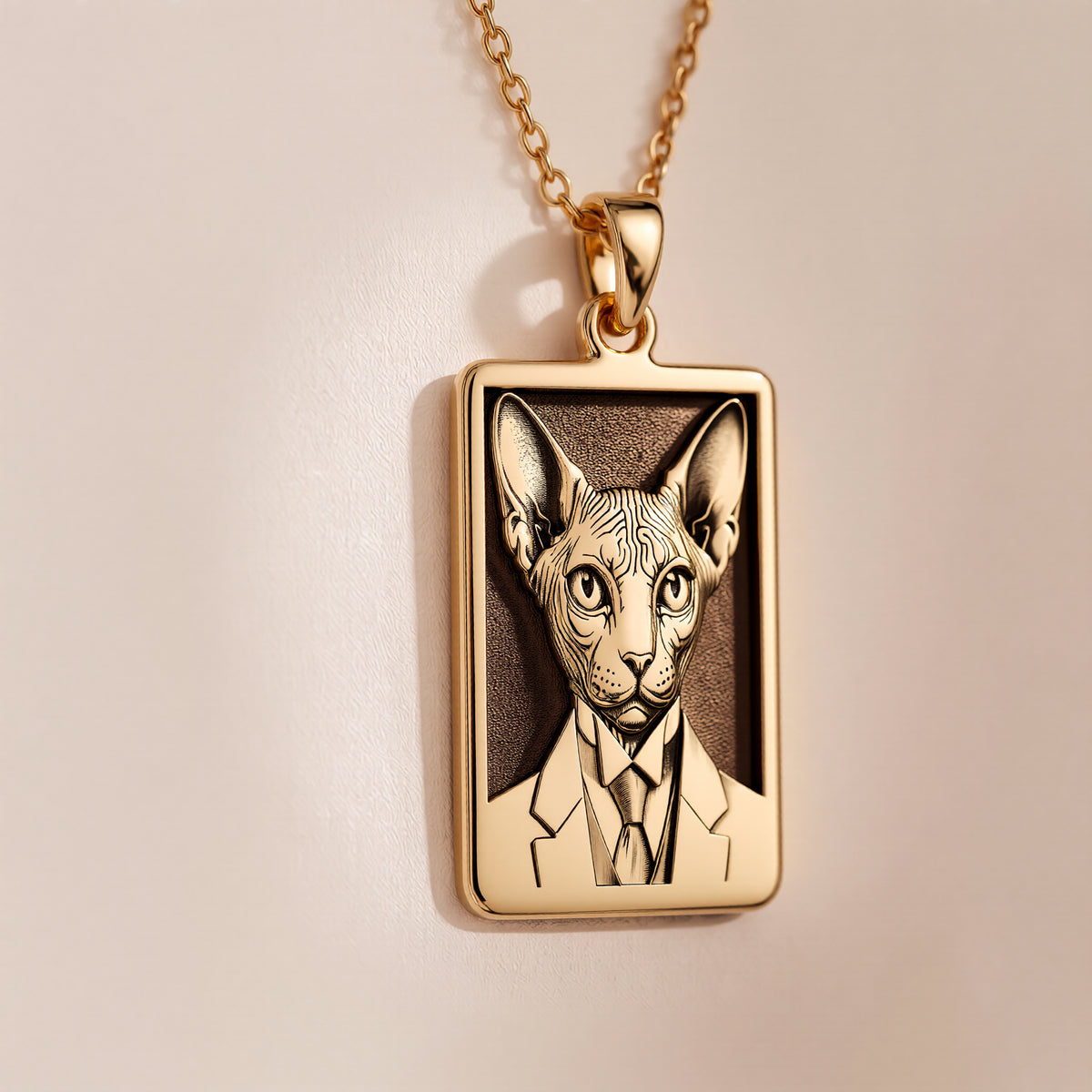 Studio front view of 14K Gold Plated Dapper Sphynx Cat Man Portrait Rectangle Pendant Necklace, featuring Gothic Dark Academia Pet Memorial & Feline Totem Charm with crisp engraved relief details.