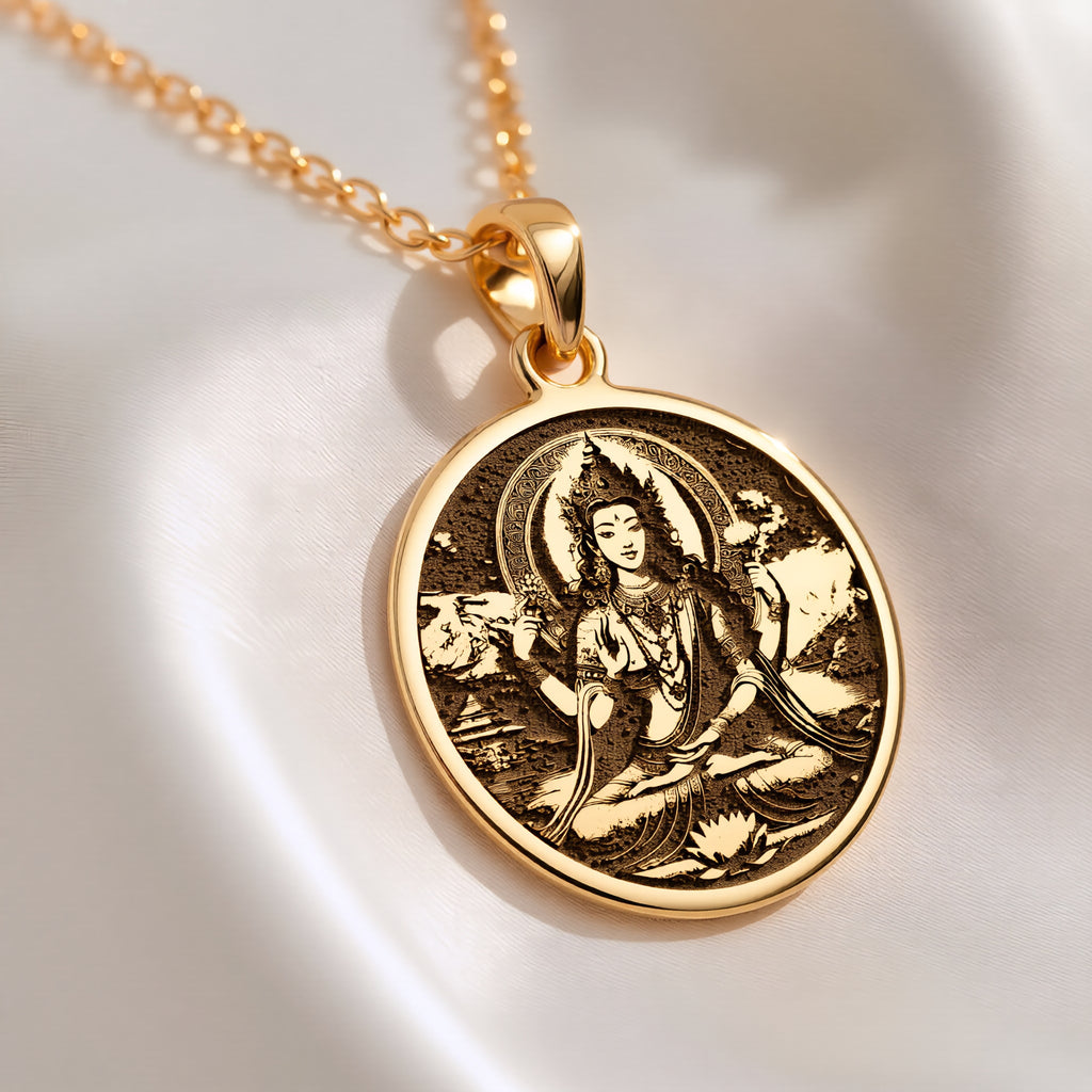 Green Tara Varada Mudra Amulet Necklace Necklaces 14K 14K Gold Plated plated pendant necklace featuring a stylized goddess design on a round disc.