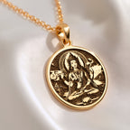 Green Tara Varada Mudra Amulet Necklace Necklaces 14K 14K Gold Plated plated pendant necklace featuring a stylized goddess design on a round disc.