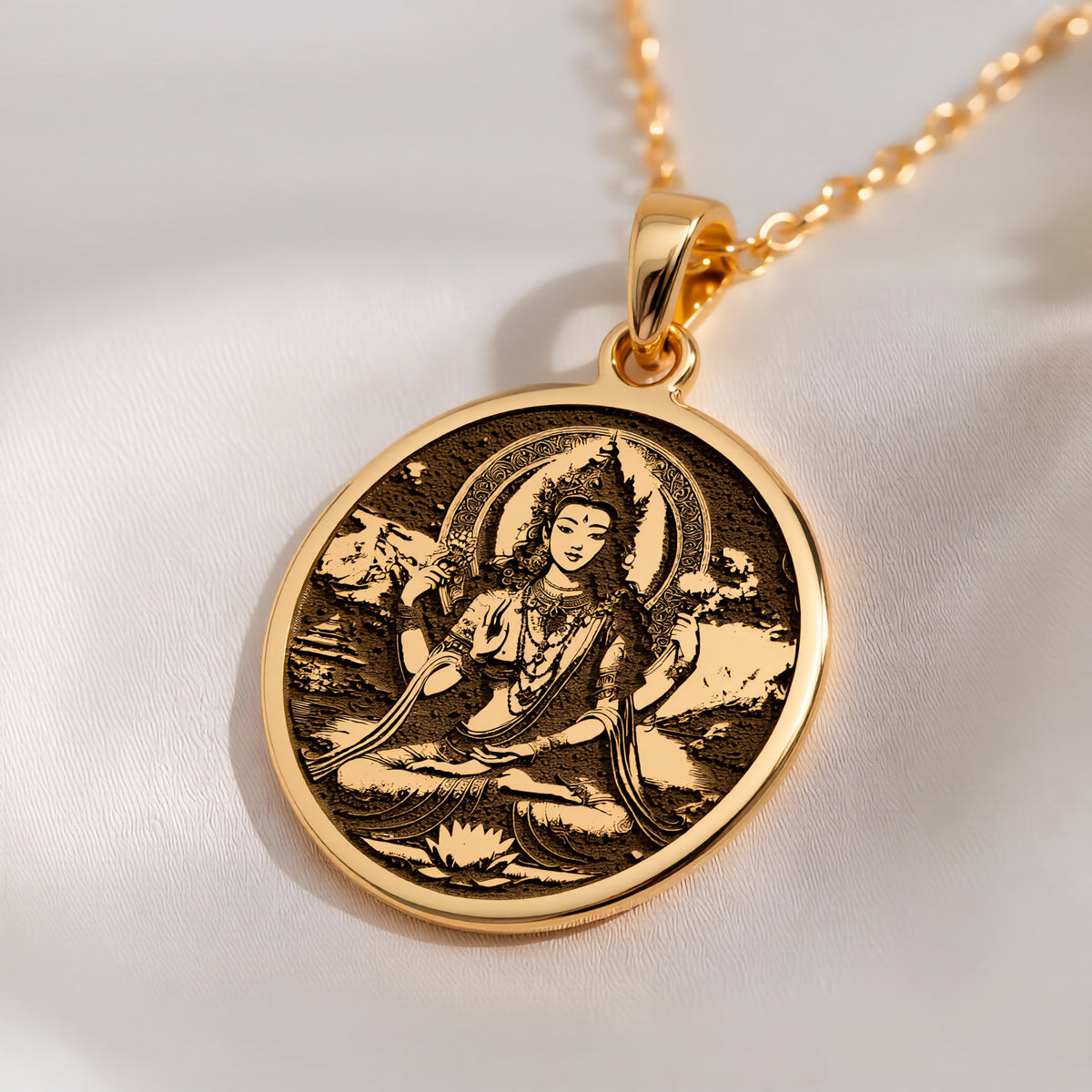 Green Tara Varada Mudra Amulet Necklace Necklaces 14K 14K Gold Plated pendant necklace featuring a seated spiritual figure design on a round disc.
