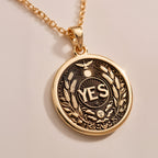 925 Sterling Silver YES Pendant with detailed affirmation design. Handcrafted silver coin charm featuring empowering word surrounded by wheat, celestial elements and flying bird. Motivation jewelry celebrating positive decisions and new beginnings.