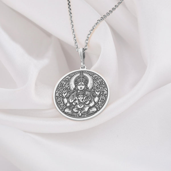 925 sterling silver Parvati medallion pendant, featuring a detailed coin design on a round disc. This amulet captures the essence of the goddess as a talisman for courage and balance, making it a meaningful addition to any jewelry collection.
