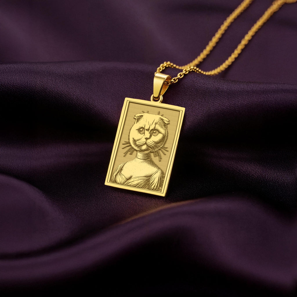 Product photo of a 14K Solid Gold Scottish Fold necklace from the 'Victorian Pet Collection'. The engraved cat is portrayed as a noble lady in a Regency-style dress.