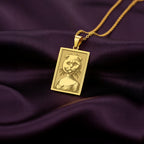 Product photo of a 14K Solid Gold Scottish Fold necklace from the 'Victorian Pet Collection'. The engraved cat is portrayed as a noble lady in a Regency-style dress.