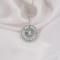 Sterling Silver Eye of Horus Protection Amulet Necklace pendant, front view: Horus with falcon head and pharaonic headdress surrounded by hieroglyphs and protective eyes.