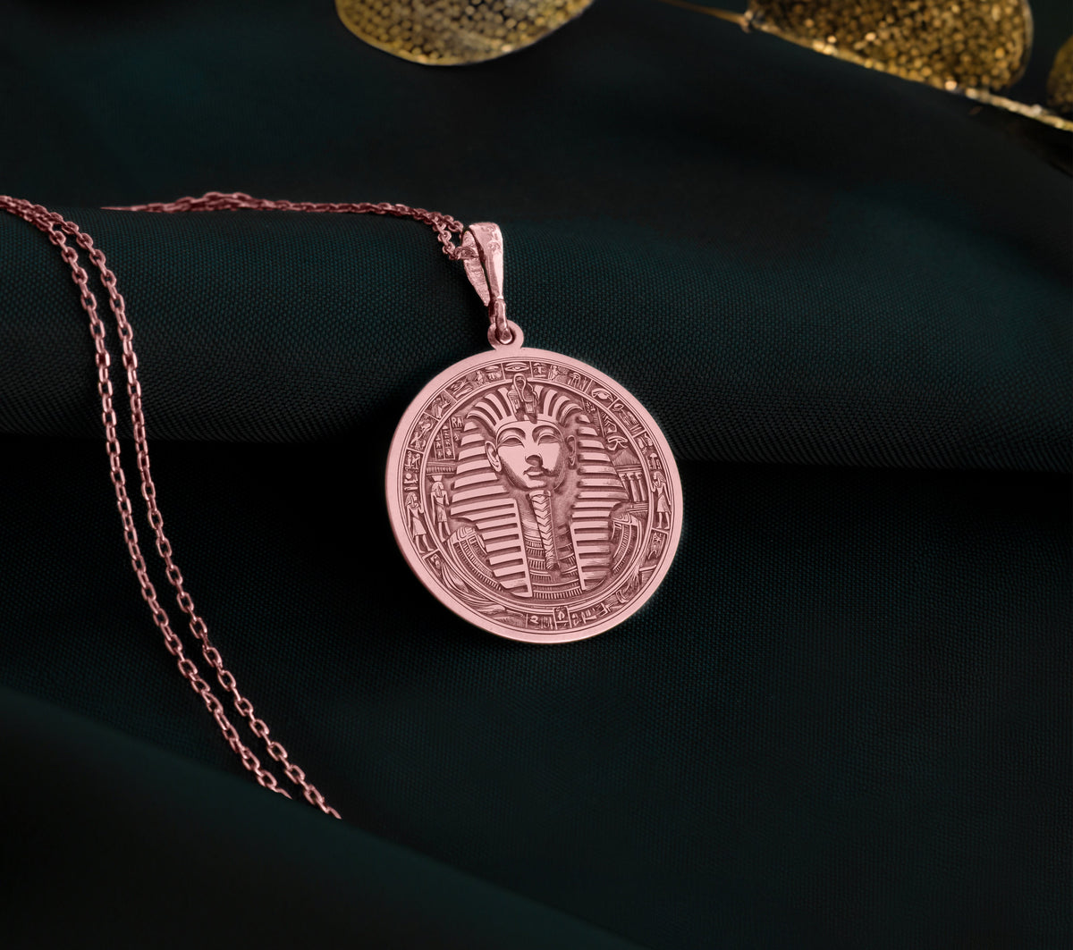 Rose gold plated Tutankhamun coin pendant, inspired by ancient Egyptian royalty. Lightweight for everyday wear, unique layering charm, this timeless gift blends elegance with mystique, perfect for those drawn to historical and spiritual symbols.