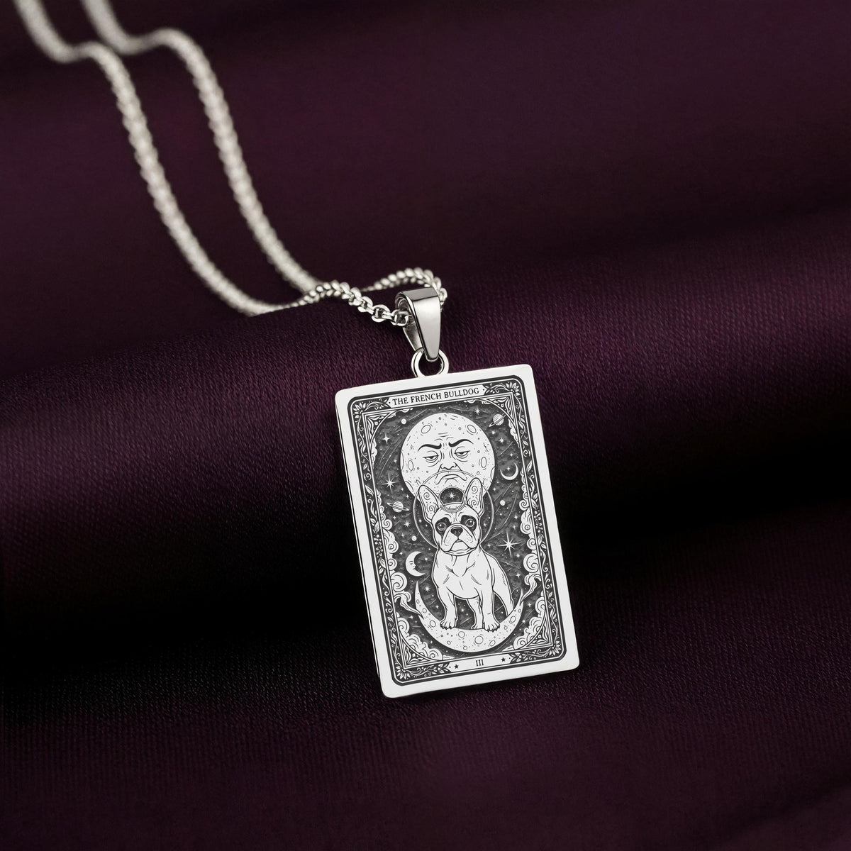 A striking 925 sterling silver French Bulldog charm. The art shows the celestial "Frenchie," a meaningful piece of jewelry for a pet owner.