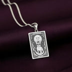 A striking 925 sterling silver French Bulldog charm. The art shows the celestial "Frenchie," a meaningful piece of jewelry for a pet owner.