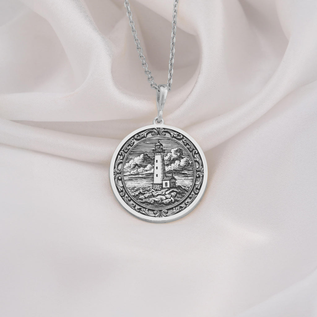 925 925 Sterling Silver Lighthouse Coastal Beacon Medallion Pendant Necklaces Silver-toned metal lighthouse engraving pendant necklace with a round shape.