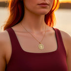 A handmade 14K gold plated Dachshund King necklace. The engraving captures the regal wiener dog, a timeless symbol of a cherished pet.