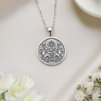 Polished silver Surya talisman capturing divine radiance from Vedic tales, fueling bold journeys – add this Hindu folklore necklace to your collection.