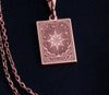 Rose gold plated Star Tarot Card pendant necklace with feminine celestial design featuring an intricate eight-pointed star radiating light. Rectangular tarot-inspired pendant with detailed engravings of moon phases and mystical symbols. Customizable spiritual jewelry for tarot enthusiasts and collectors. Personalized metaphysical gift with &quot;THE STAR&quot; inscription. Major Arcana talisman representing hope, divine guidance, and renewal with warm rose gold tones