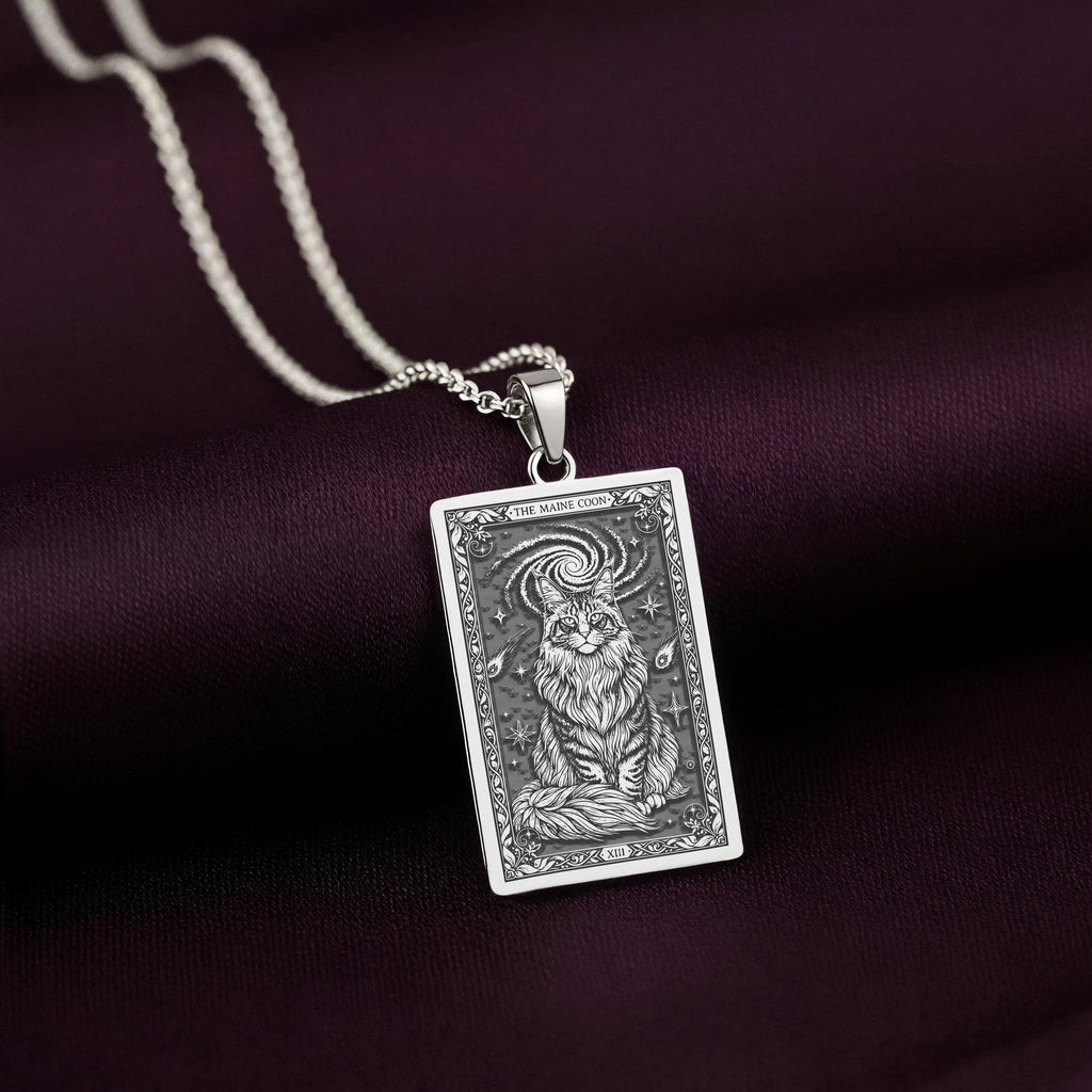 A striking 925 sterling silver Maine Coon charm. The art shows the witchy, cosmic cat, a meaningful piece of celestial jewelry for her.