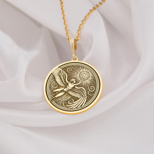 14K Solid Gold Icarus pendant, featuring a beautifully engraved Greek mythology medallion with wings and the sun. A powerful gold celestial necklace, symbolizing ambition, courage, and freedom.