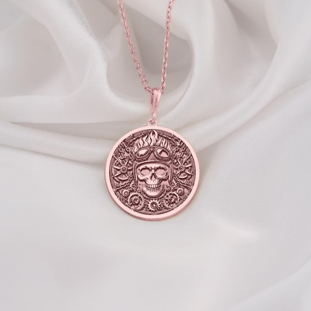 Rose Gold Plated Biker Skull Medallion featuring aviator helmet and steampunk elements. Bold statement jewelry with detailed goggles and mechanical components. Warm-toned gothic talisman, perfect gift for motorcycle enthusiasts and rockers.