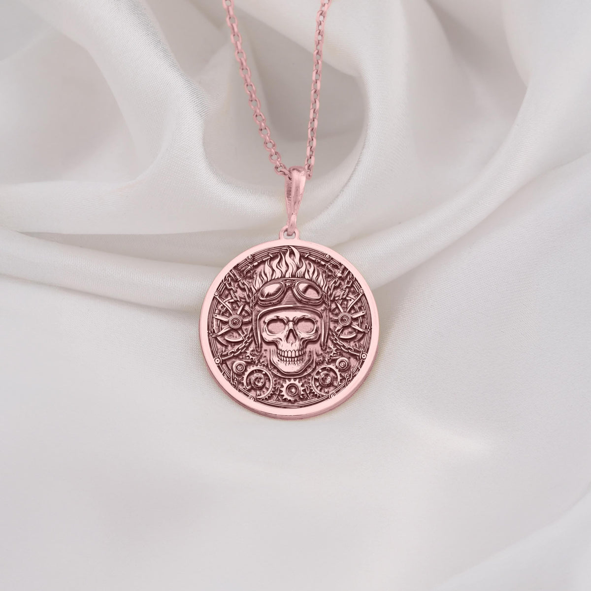 Rose Gold Plated Biker Skull Medallion featuring aviator helmet and steampunk elements. Bold statement jewelry with detailed goggles and mechanical components. Warm-toned gothic talisman, perfect gift for motorcycle enthusiasts and rockers.