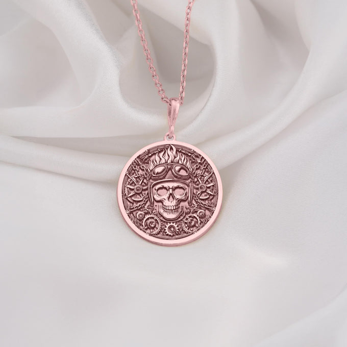 Rose Gold Plated Biker Skull Medallion featuring aviator helmet and steampunk elements. Bold statement jewelry with detailed goggles and mechanical components. Warm-toned gothic talisman, perfect gift for motorcycle enthusiasts and rockers.