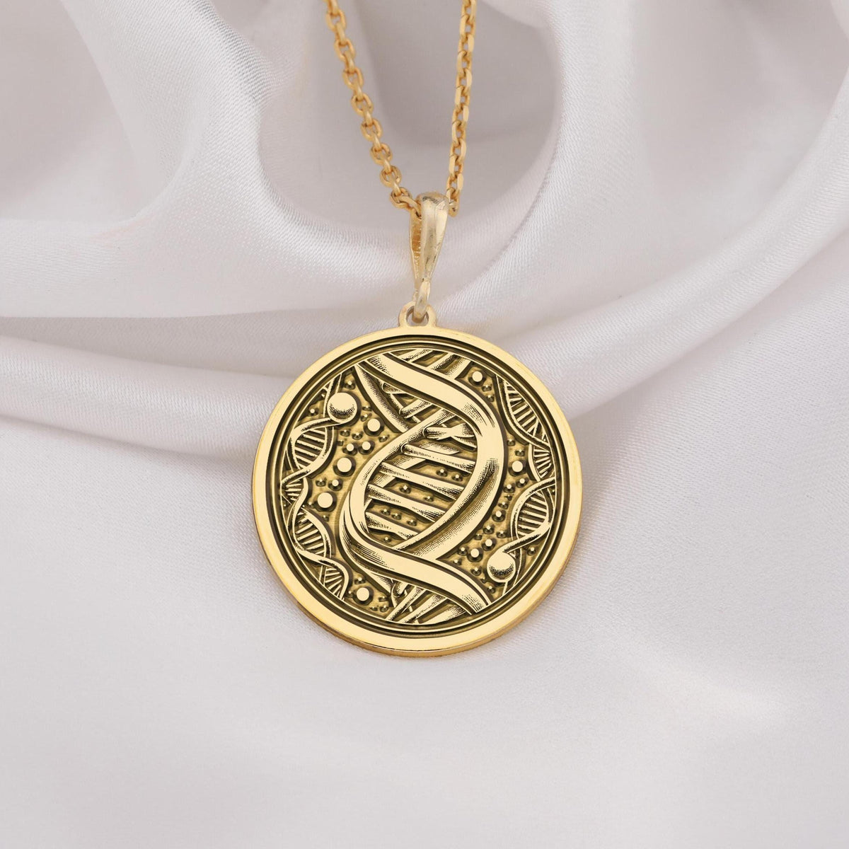DNA Double Helix Science Pendant Necklaces 14K 14K Gold Plated pendant necklace with intertwined knotwork design on a round disc.