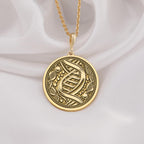 DNA Double Helix Science Pendant Necklaces 14K 14K Gold Plated pendant necklace with intertwined knotwork design on a round disc.