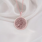 Rose Gold Plated Raven Pendant Necklace showcasing a Mayan-inspired Aztec calendar design. A meaningful jewelry gift for history and mythology admirers. A stylish accessory for any occasion.