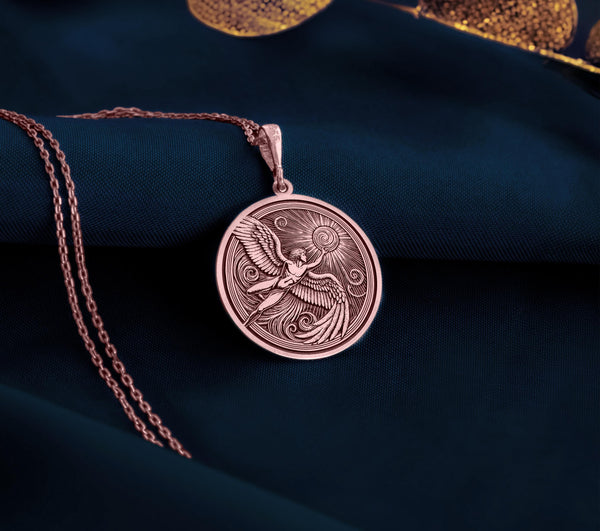 Rose Gold Plated mythology necklace, engraved with a detailed winged Icarus reaching for the sun. A meaningful freedom and ambition pendant, perfect for those who dare to dream.