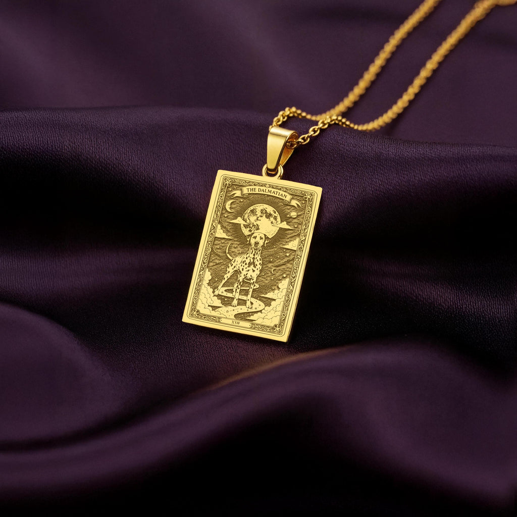 An heirloom-quality 14K solid gold Dalmatian tarot pendant. The art shows the spotted dog under the moon, symbolizing loyalty, a precious dog mom gift.