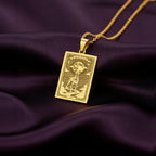 An heirloom-quality 14K solid gold Dalmatian tarot pendant. The art shows the spotted dog under the moon, symbolizing loyalty, a precious dog mom gift.