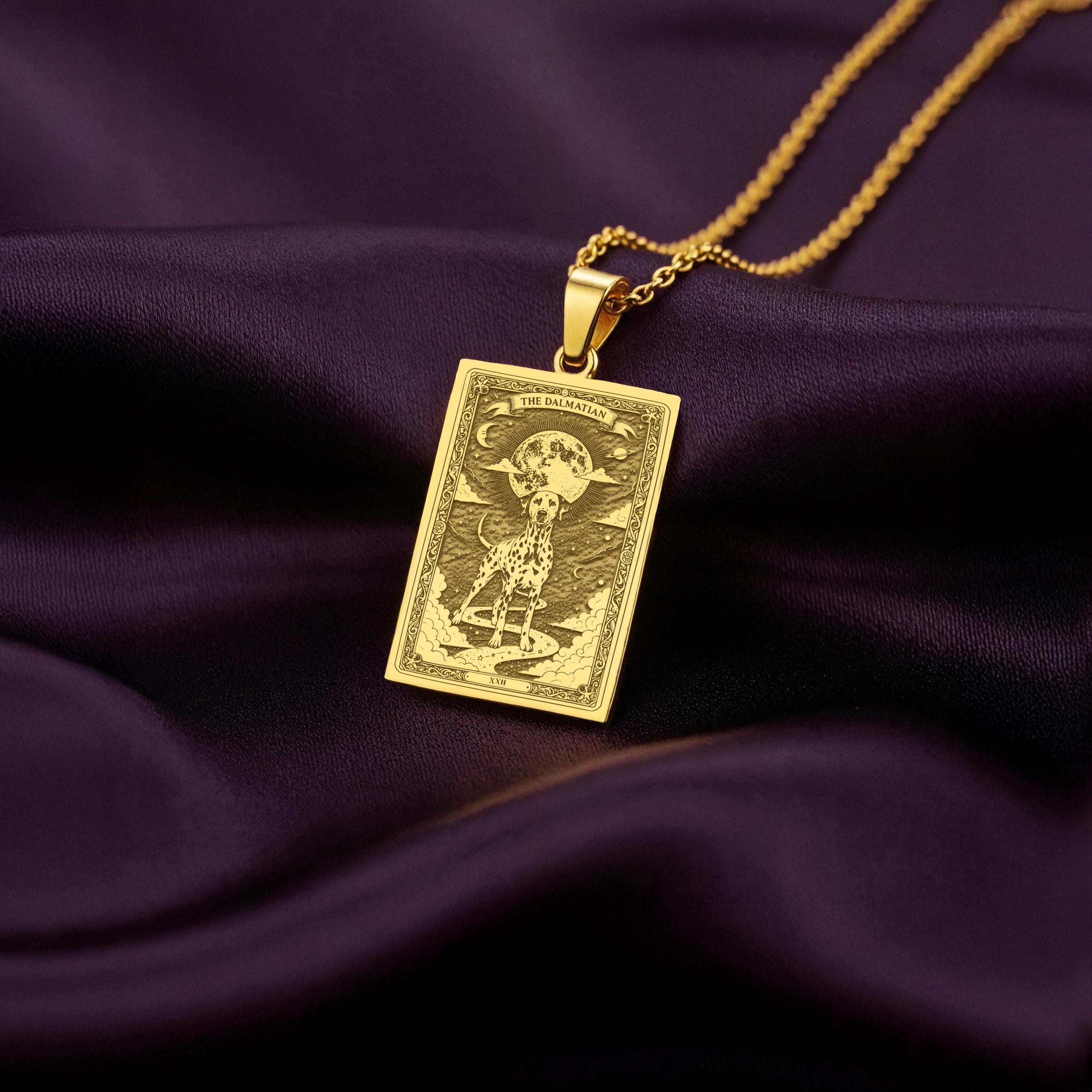 An heirloom-quality 14K solid gold Dalmatian tarot pendant. The art shows the spotted dog under the moon, symbolizing loyalty, a precious dog mom gift.