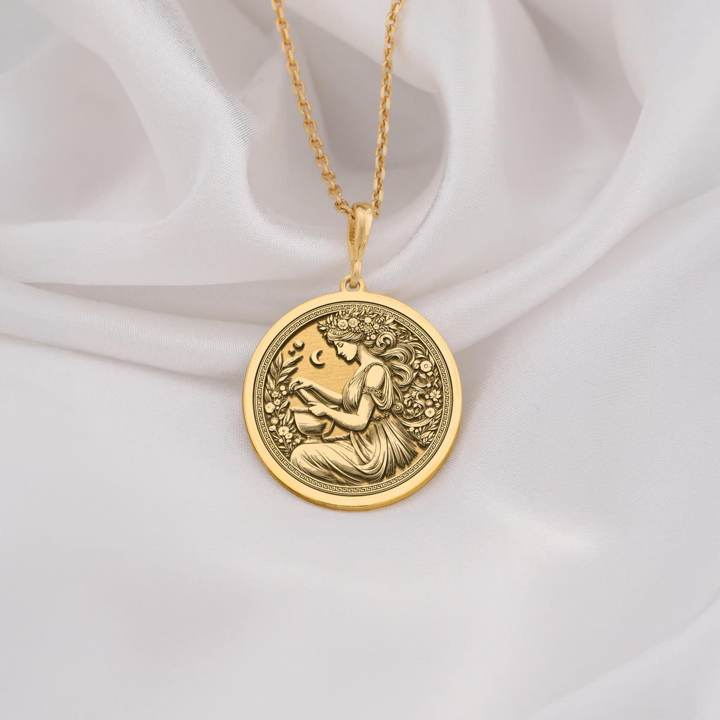 14K Solid Gold Panacea Medallion featuring Greek healing goddess with herbs and celestial symbols. Ancient medicine coin with intricate floral border and flowing hair design. Luxury wellness jewelry gift symbolizing divine and healing.