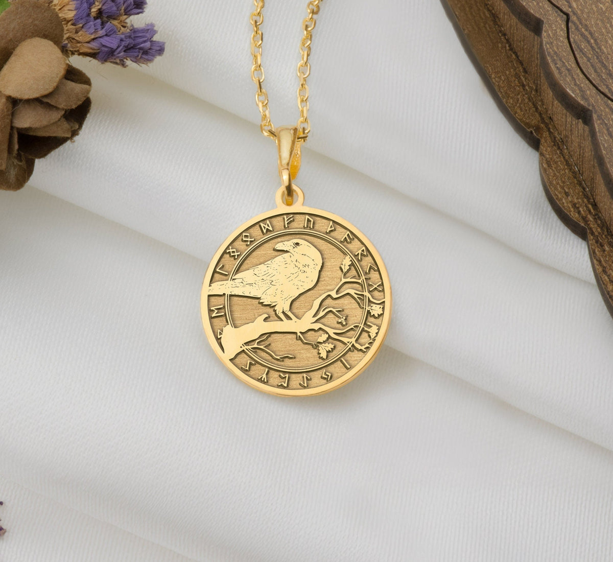 Gold Celtic raven necklace pendant, symbolizing wisdom and resilience. This dainty charm is crafted for everyday wear or layering, perfect for spiritual jewelry lovers. A unique gift, lightweight and versatile, inspired by Celtic lore and mysticism.