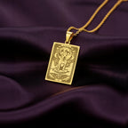 A polished 14K solid gold Shar-Pei medallion. This fine pet jewelry represents the breed's stoic nature, making it a perfect Shar-Pei lover gift.