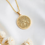 A personalized 14K gold plated Virgo medallion. This astrology jewelry is a perfect birthday gift for the practical Earth Sign, born in August or September.