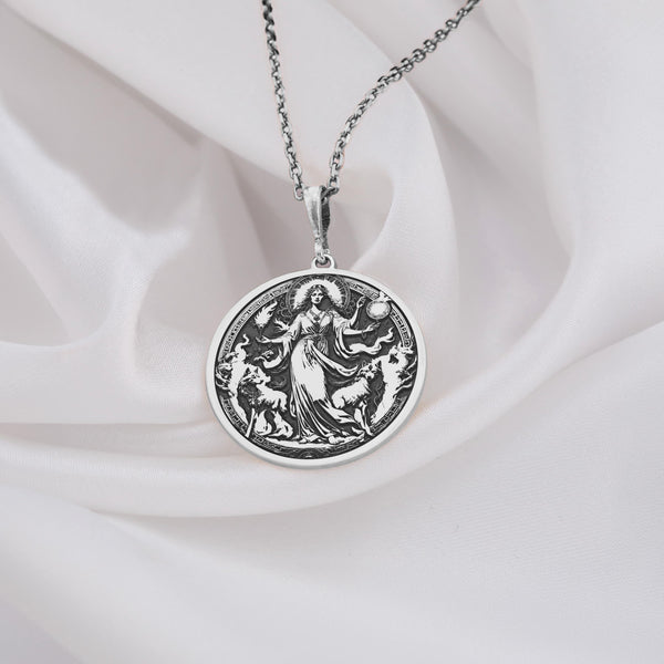 Silver Hecate charm pendant showcasing the triple moon goddess, a sacred symbol of magic, transformation, and divine intuition. Crafted for spiritual seekers, witches, and those drawn to lunar energy, this amulet embodies protection and inner wisdom. Rooted in ancient mythology, it represents the crossroads, the phases of the moon, and the cycle of life. A perfect gift for Wiccans, pagans, and those embracing goddess energy, spirituality, and mystical knowledge in their daily rituals.