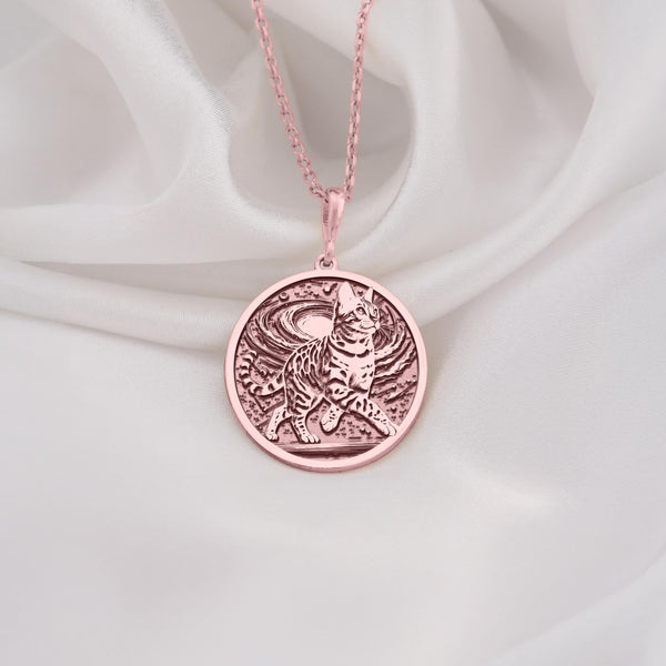 a necklace with a picture of a man on it