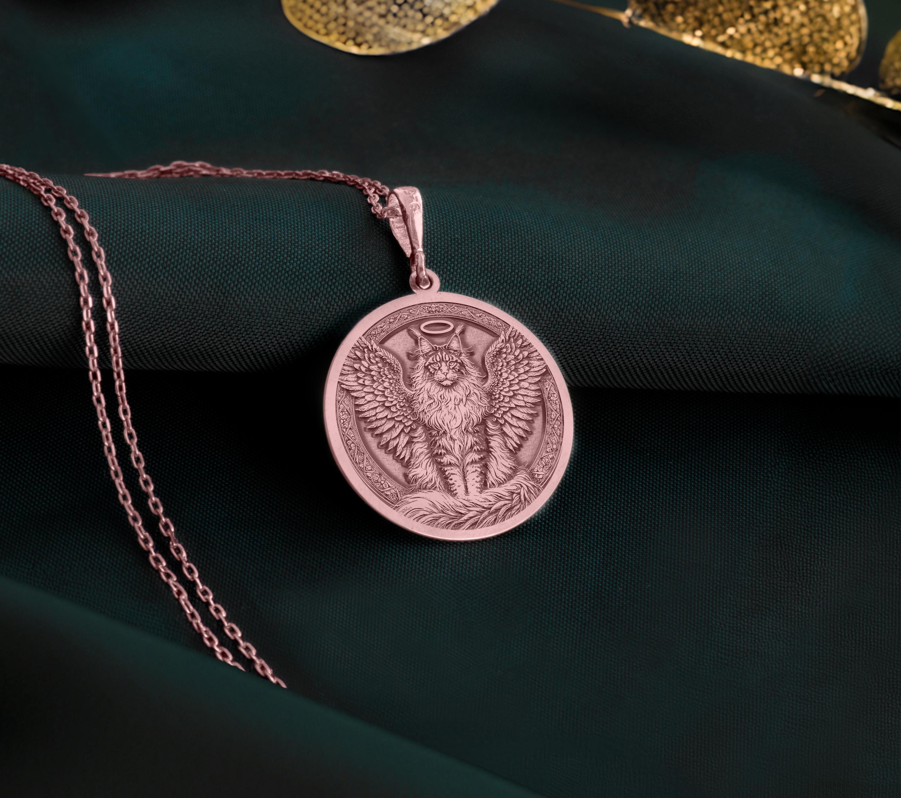 Rose Gold Plated Maine Coon Angel Pendant with memorial design. Warm-toned large cat breed medallion with detailed wings, halo and distinctive features. Rainbow bridge jewelry celebrating eternal love and connection, perfect for grieving cat parents.