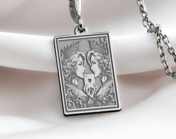 Silver Ace of Queens pendant showcasing two queens with regal crowns, celebrating women-loving-women (WLW) and unity with fine craftsmanship.