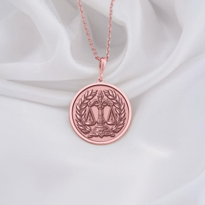 Rose gold-plated Scales of Justice Necklace, personalized with initials or date. Ideal gift for lawyers, symbolizes law, balance, justice, equality. Perfect for law professionals, advocates, and Libra zodiac. Custom jewelry.