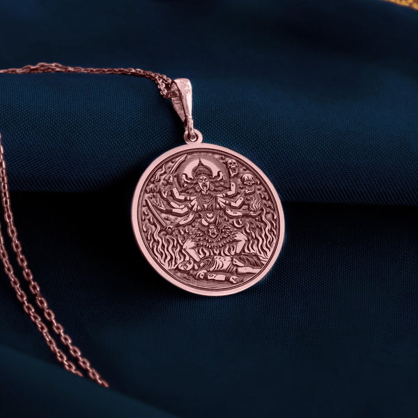 rose gold Kali Mata pendant, a protective talisman embodying the fierce energy of the Hindu goddess.
