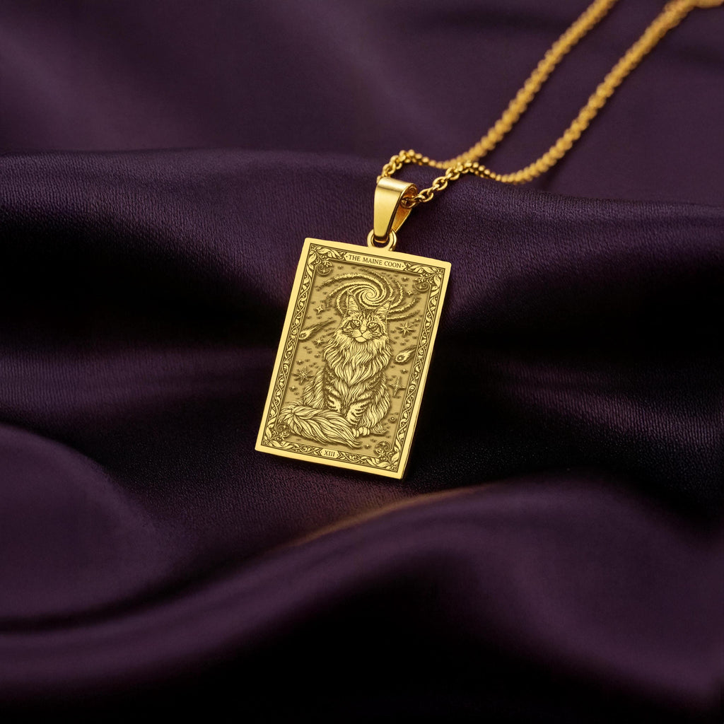 A polished 14K solid gold Maine Coon medallion. This fine pet jewelry represents the breed's "gentle giant" spirit, a perfect cat lover gift.