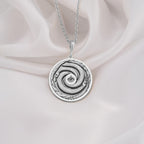 Sterling Silver Ouroboros Necklace crafted with fine details, showcasing the eternal snake symbol of rebirth and cycles. A meaningful gift or statement piece for any occasion.