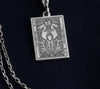 Silver Ace of Queens pendant with two intricately detailed queens and a heart symbol, symbolizing love, pride, and connection. Ideal LGBTQ+ jewelry piece.