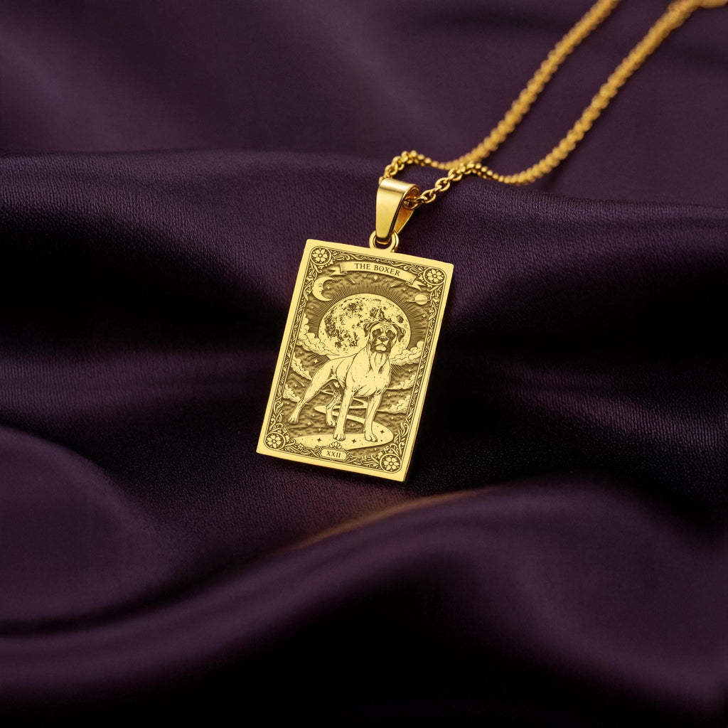 A polished 14K solid gold Boxer medallion. This fine pet jewelry represents the breed's playful energy, a perfect dog lover gift.