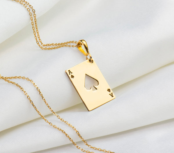 Gold Ace of Spades rectangle pendant, playing card charm necklace, minimalist style, 14k gold necklace, boho-inspired, handcrafted, resilience symbol, lightweight for everyday wear, unique gift, perfect for layering, timeless elegance for all styles.