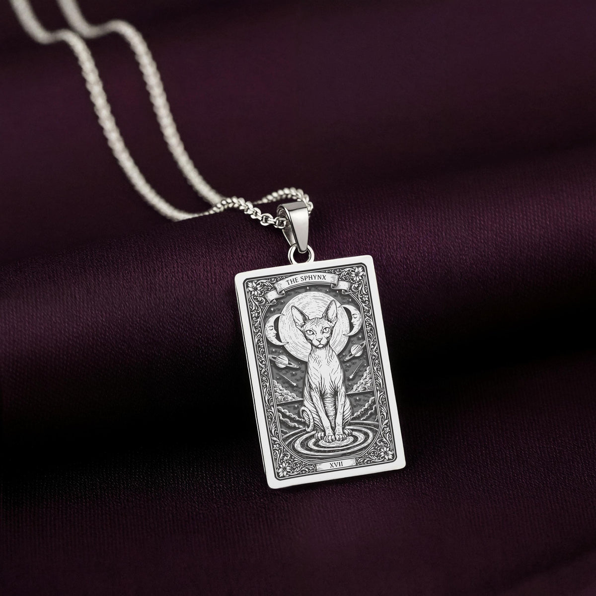 A striking 925 sterling silver Sphynx Cat charm. The art shows the serene "Egyptian" cat, a meaningful piece of witchy jewelry for her.