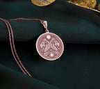 Rose gold plated Egyptian Aker necklace featuring a double lion design. A unique handmade unisex mythology jewelry piece inspired by ancient Egypt.