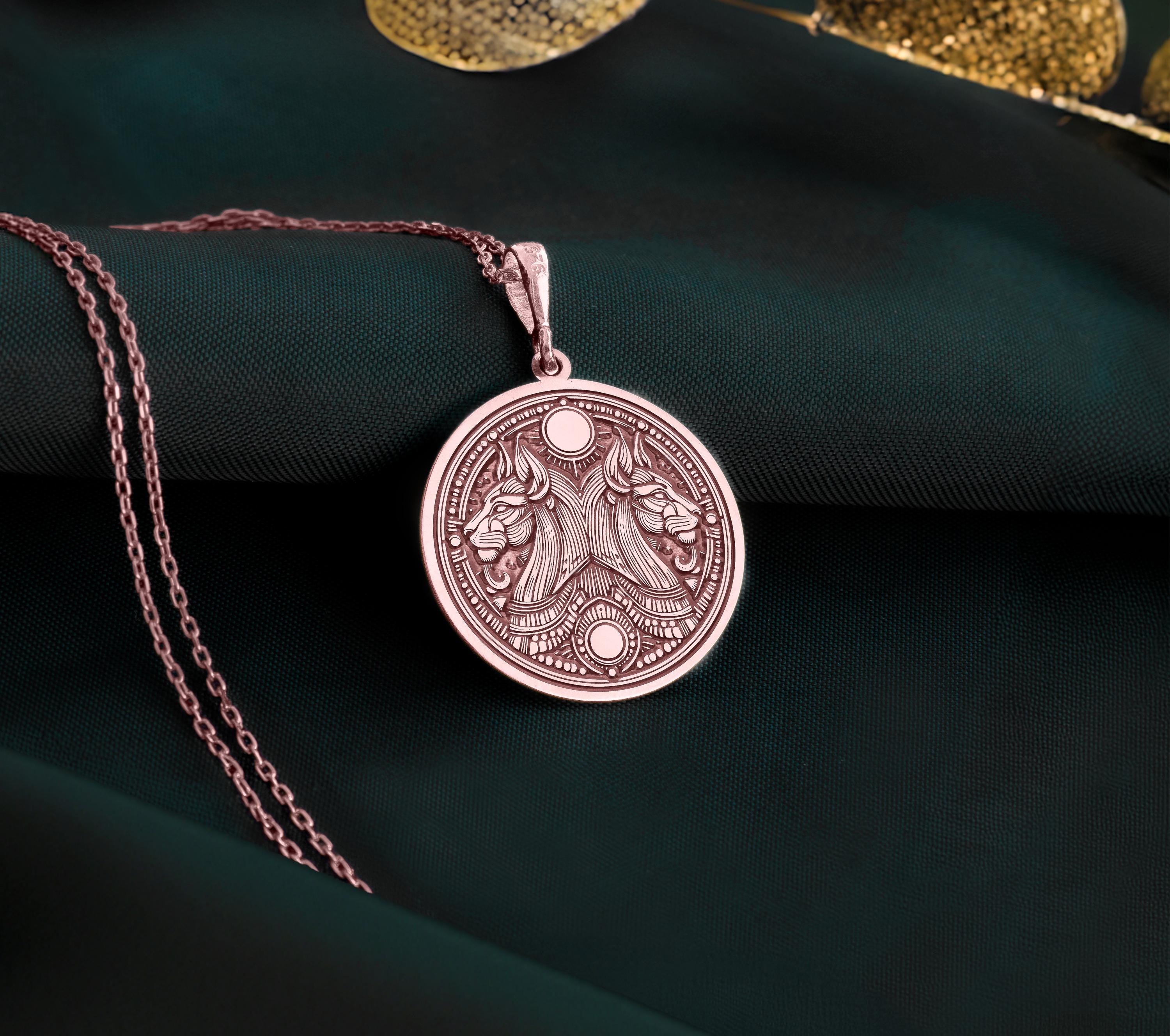 Rose gold plated Egyptian Aker necklace featuring a double lion design. A unique handmade unisex mythology jewelry piece inspired by ancient Egypt.