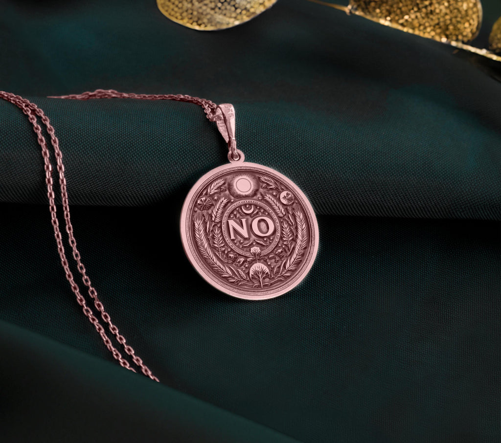 Rose Gold Plated NO Pendant with boundary affirmation design. Warm-toned self-respect medallion with detailed evil eye, moon and botanical motifs. Empowerment jewelry celebrating personal limits and conscious decision-making.