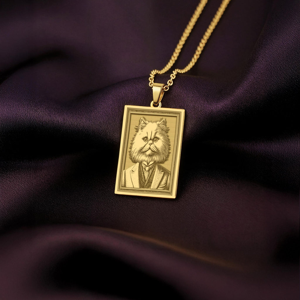 Product photo of a 14K Solid Gold Persian Cat necklace from the 'Victorian Pet Collection'. The engraved cat is portrayed as a distinguished gentleman with a noble expression.