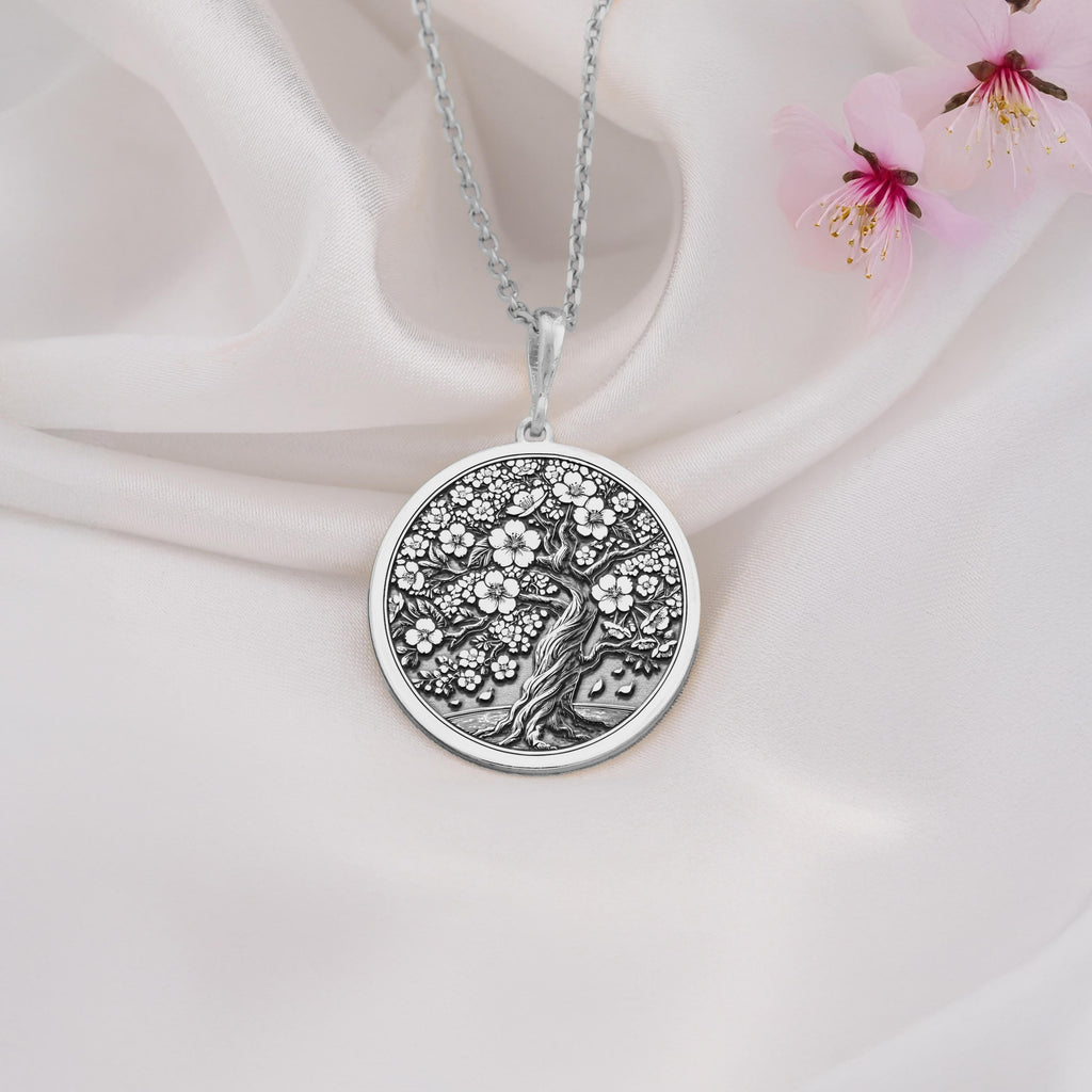 925 Sterling Silver Sakura Tree Pendant showcasing a delicate cherry blossom design, perfect for nature enthusiasts and timeless jewelry collectors.